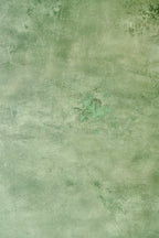 A heavy texture plaster sample made in custom green glaze color for a room visualizer feature.