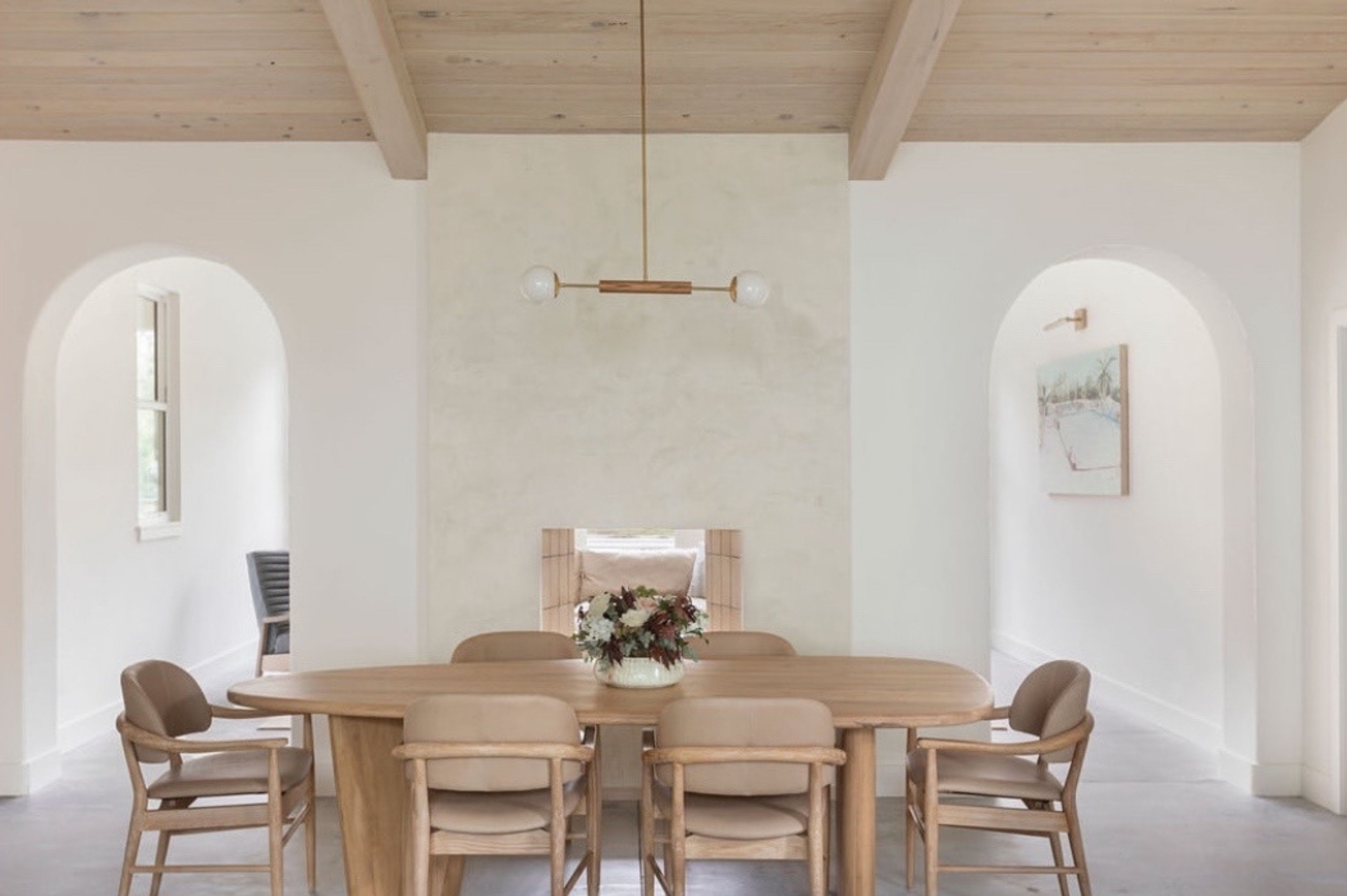 Double-sided Venetian plaster fireplace in the Historic Old Village of Mount Pleasant featuring a custom blended cream finish created specifically for the client.