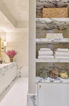 Cream and warm Venetian plaster bathroom walls and ceiling by Emily Pope Harris at the Kips Bay Designer Show House in Palm Beach, FL, designed by Betsy Berry, featuring two-toned color variation, burnish, polish, and subtle sheen.