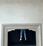 Close-up of a cream Venetian plaster fireplace with a soft burnish by Emily Pope Harris, designed by Margaret Donaldson Interiors, showing subtle sheen and texture as light hits the surface.