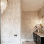 Subtle, soft cream plaster on walls and ceiling in a Greenville, SC master bathroom by Emily Pope Harris, creating a warm, transformed space.