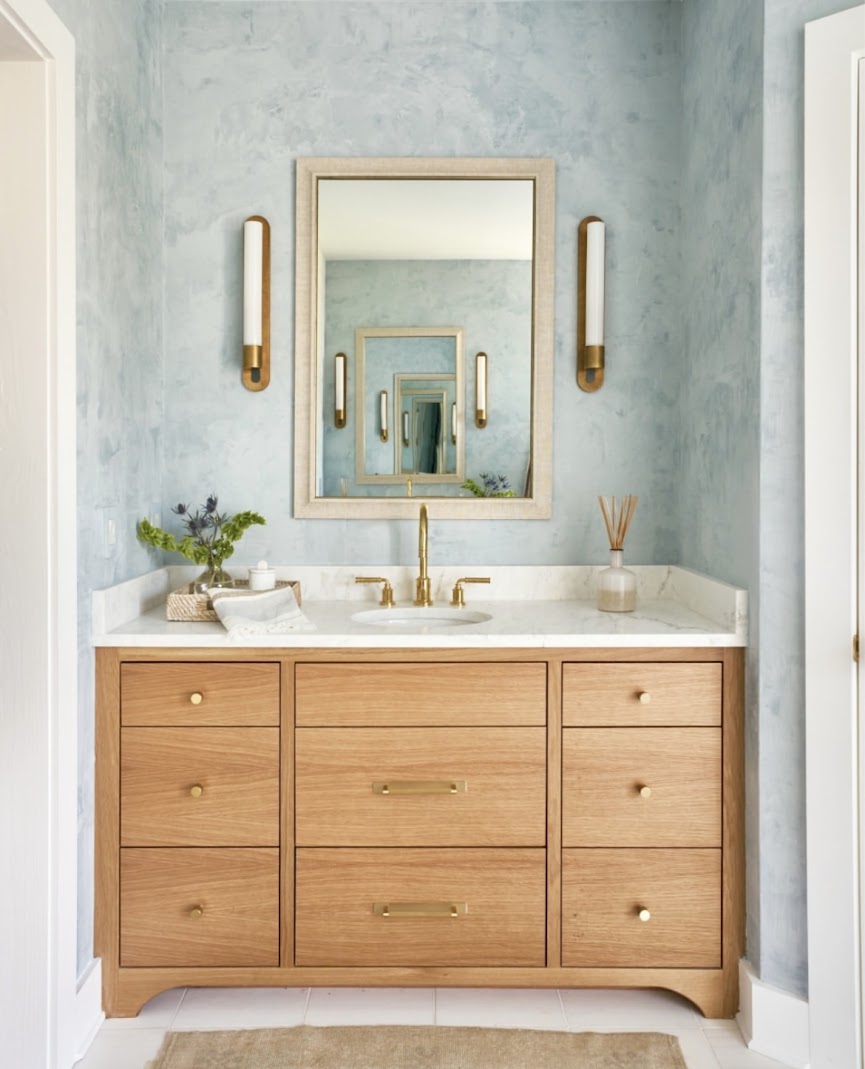 Custom light blue Venetian plaster wall with burnish and polished sheen in a master bathroom at the CSOL Designer Show house in Charleston, SC, designed by PWD Studio.